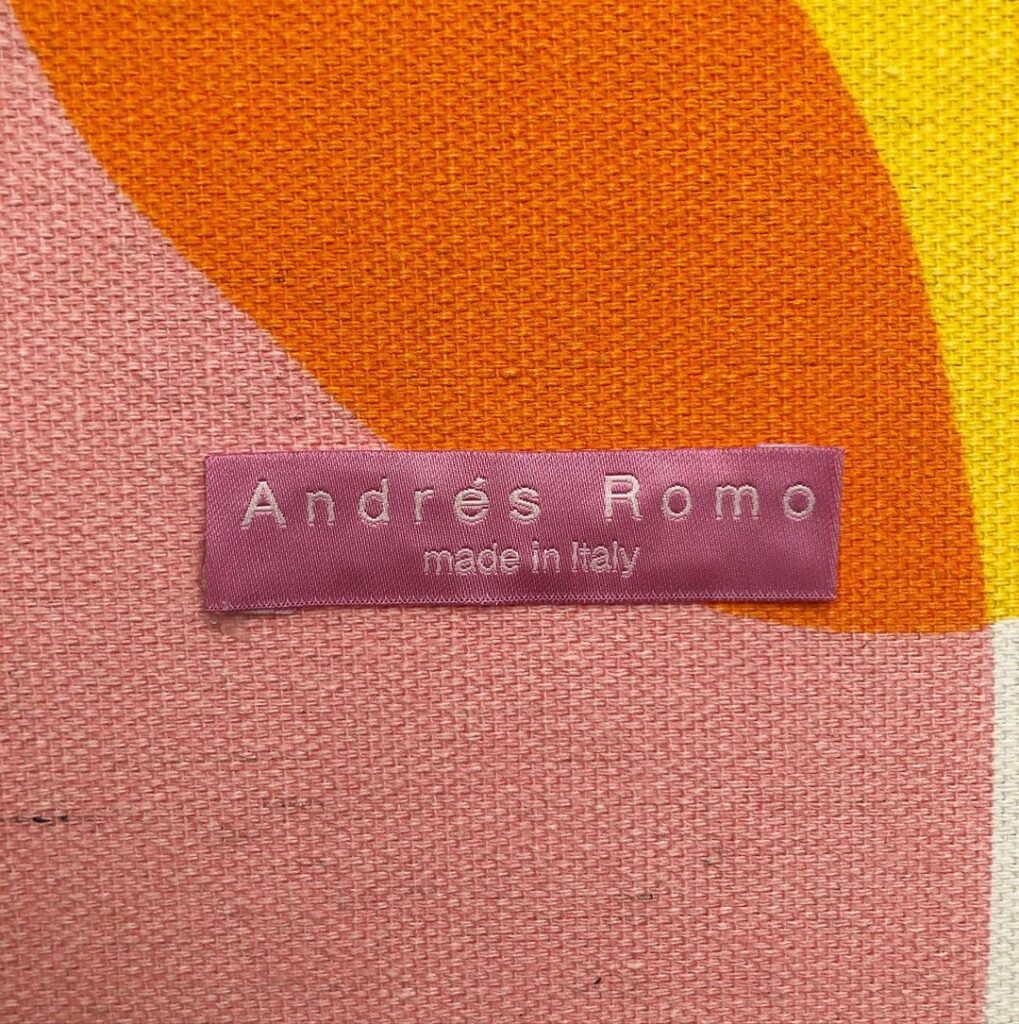 Etiqueta de marca de Andrés Romo