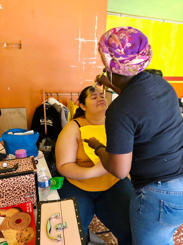 Women preparing for the telenovela at the Migrant Space in Tijuana