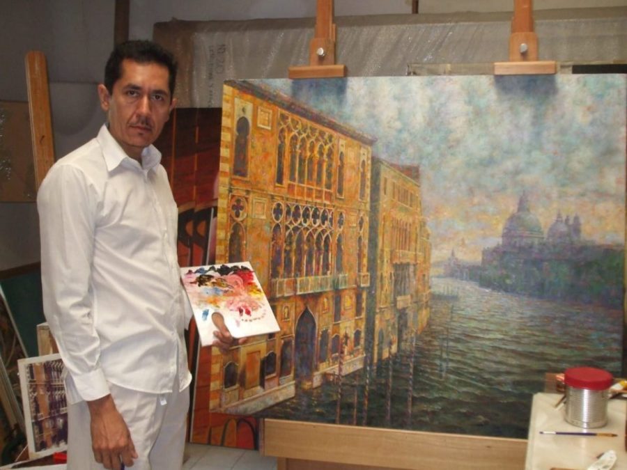 Ernesto Ríos Rocha con una pintura en caballete. FOTO: México Desconocido.