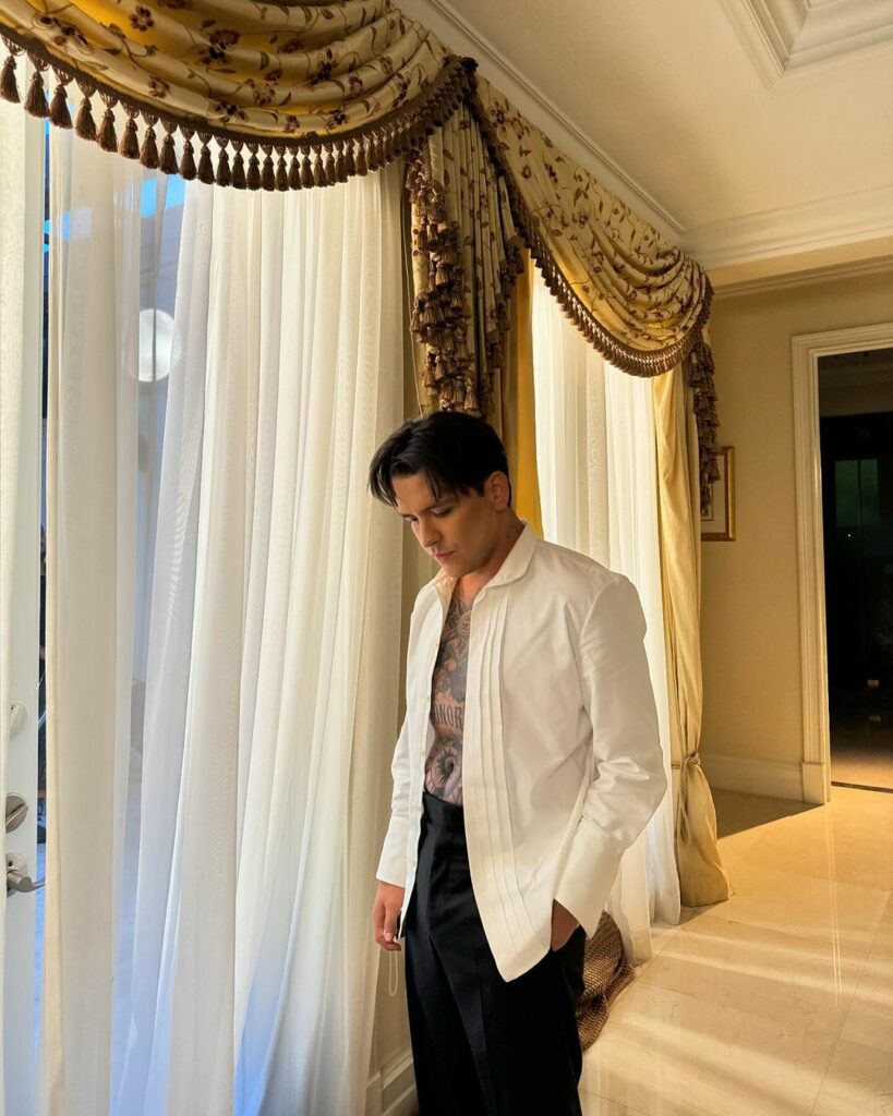 Christian Nodal shares photos without tattoos on his face.